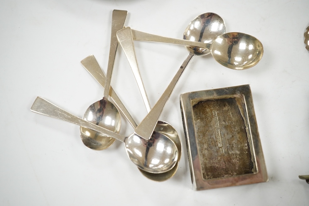 A group of small silverware, including a double ended scent bottle, 13cm, flatware, dishes, match sleeve etc. Condition - poor to fair